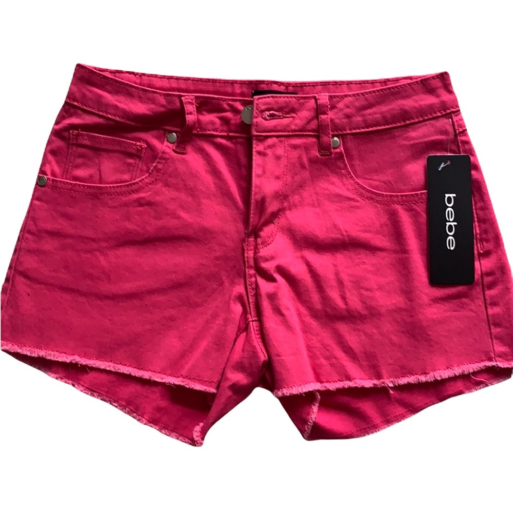 Raspberry Bebe Shorts. With Bebe embellishment on back right pocket. Size 26